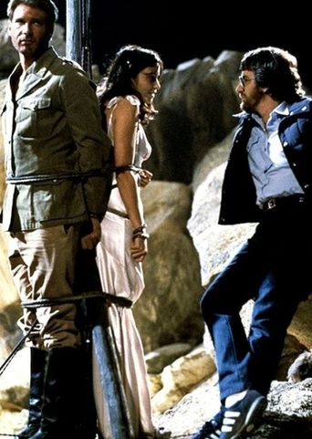  On Set With "Raiders Of The Lost Ark" Poster