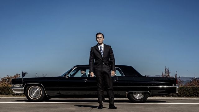 The Man Standing Next Backdrop