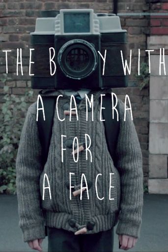  The Boy with a Camera for a Face Poster