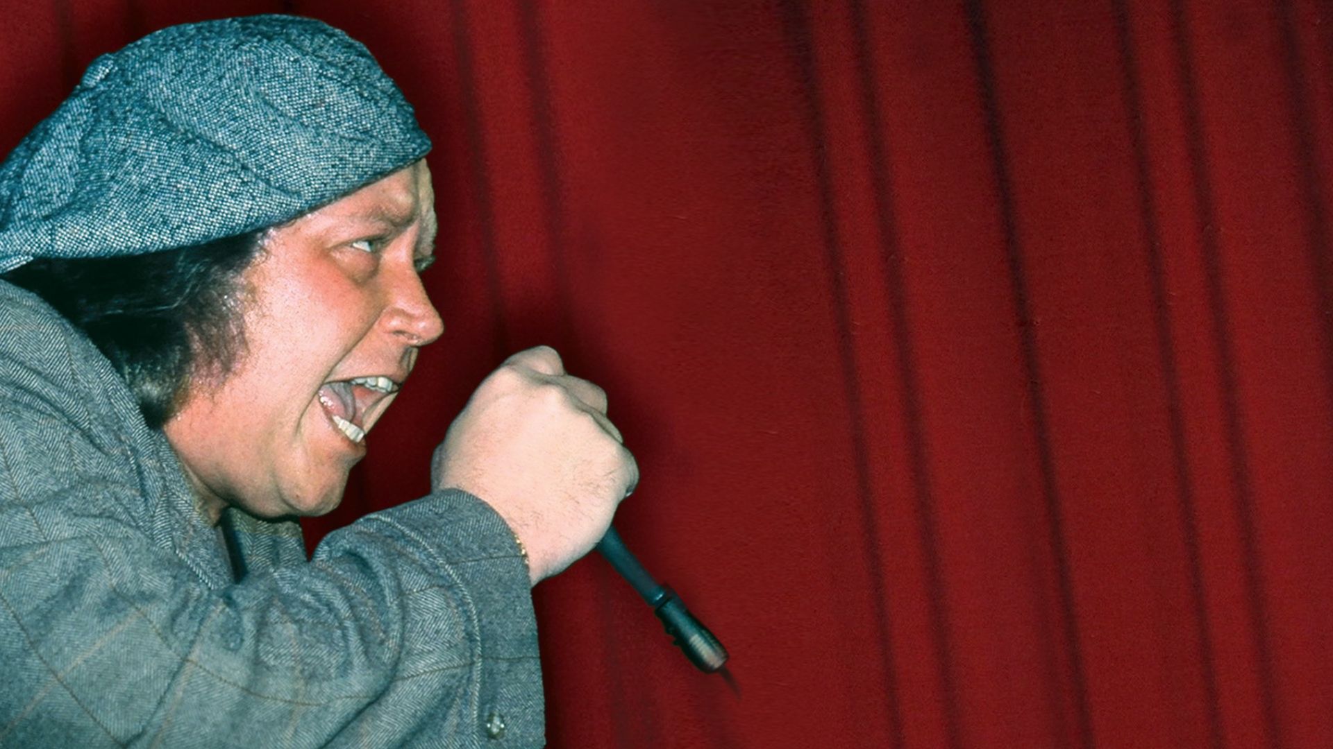 Sam Kinison: Why Did We Laugh? Backdrop