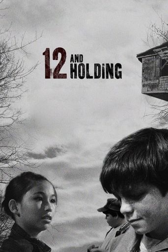  12 and Holding Poster